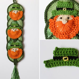 May include: A green and orange crocheted wall hanging featuring three leprechaun faces with green hats and orange beards. The hanging has a green tassel at the bottom.