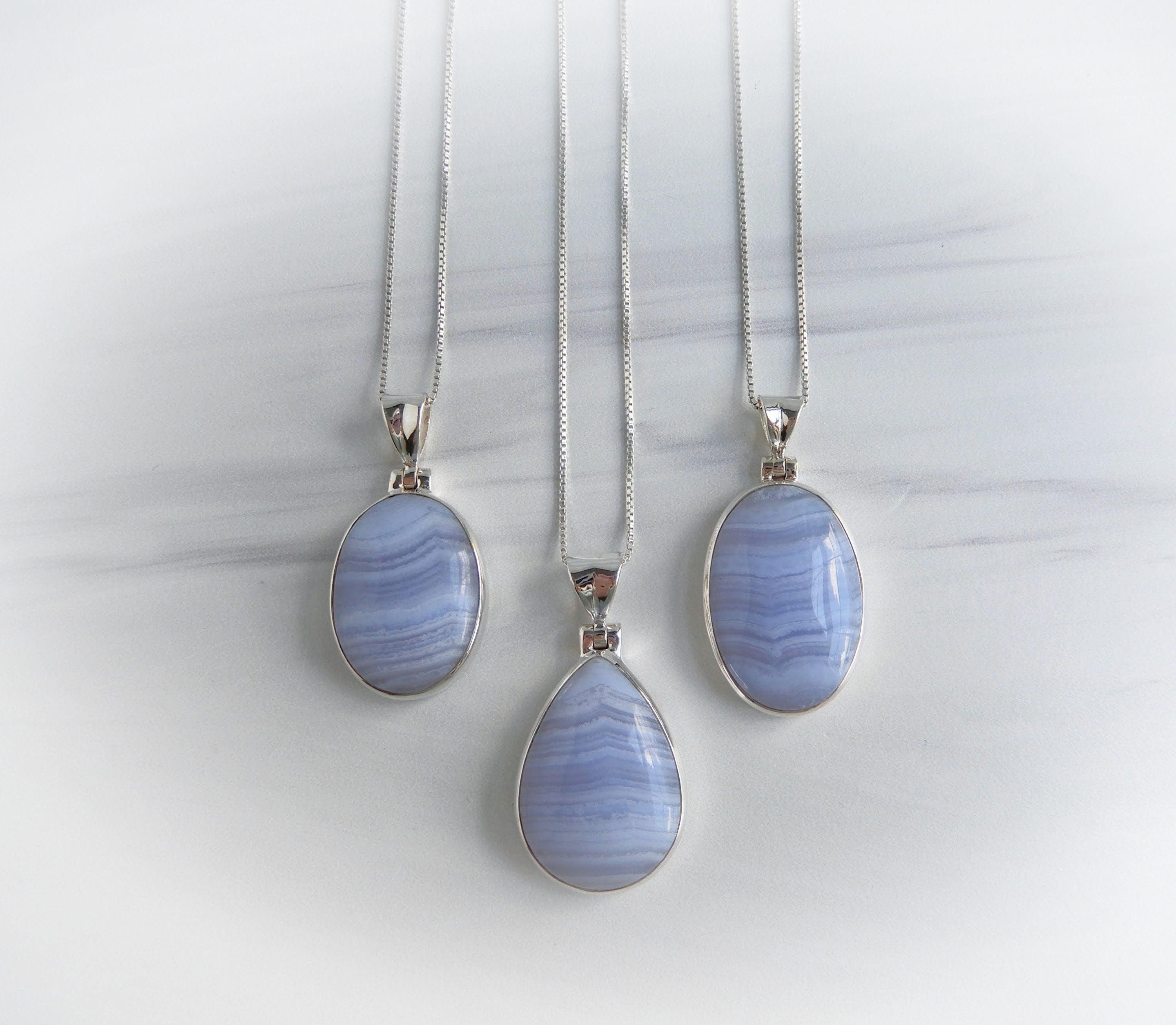 This Stunning Blue Lace Agate Necklace is created by wire wrapping  together, Sterling Silver wire, Sterling Silver jump rings, Swarovski  Crystals & beaded gemstones to form the necklace. Stone: 30mm x 25mm