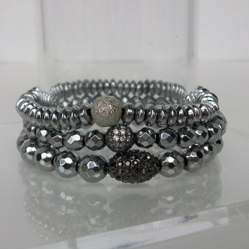 SILVER FACETED HEMATITE 2MM BEAD BRACELET W/ SMALL INSPIRE GOLD CHARM