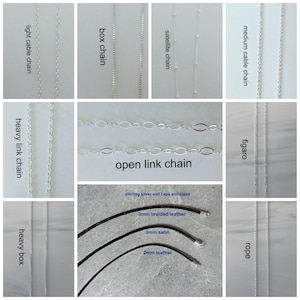 May include: A close-up of various silver chains, including box, cable, satellite, heavy link, open link, figaro, and rope chains. The chains are displayed on a white surface. The text "sterling silver end caps and clasp" is visible at the bottom of the image.