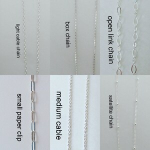 May include: A close-up of ten different types of silver chains, including open link, satellite, box, cable, and paper clip chains.