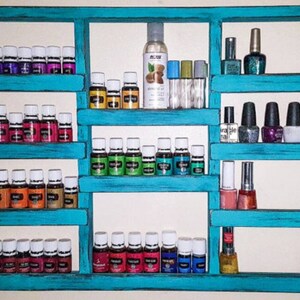 May include: Teal wooden shelf unit with five shelves, holding rows of small glass bottles and nail polish bottles.
