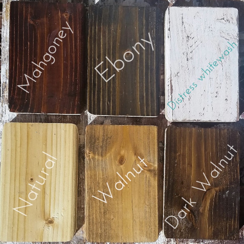 May include: Six wood samples stained in different colors: mahogany, ebony, distressed whitewash, natural, walnut, and dark walnut.