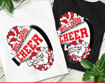 May include: A white t-shirt and a black t-shirt, each featuring a graphic of a megaphone, red and white pom-poms, and a bulldog head. The megaphone displays the text BULLDOGS CHEER in bold red letters. The design is centred on the front of each shirt.