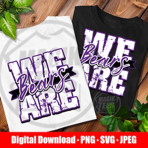 May include: A white t-shirt and a black t-shirt, each featuring a graphic design with the text WE ARE in large, distressed white letters with purple outlines, and the word Bears in a purple script font across a black horizontal banner.