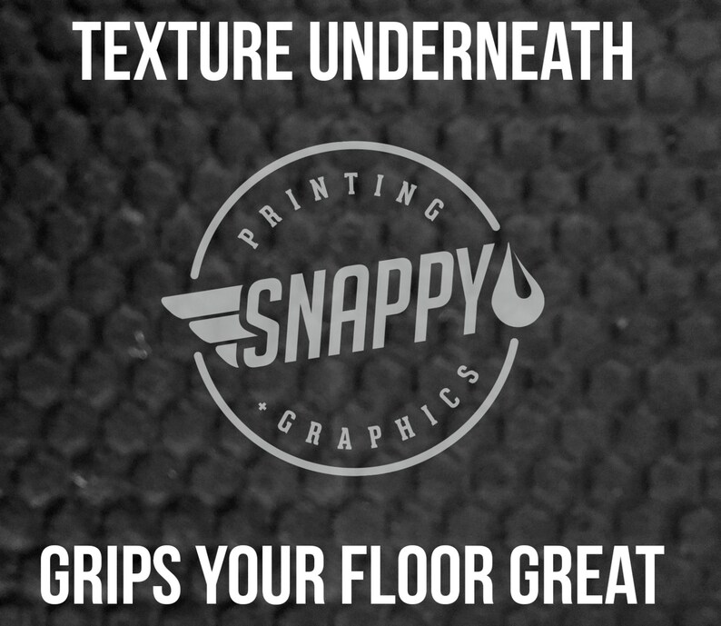 May include: A black and white logo for "Snappy Printing Graphics" with a textured background. The logo features a circle with the text "Snappy" inside and a wing and a water drop on either side. The text "Texture underneath grips your floor great" is above the logo.