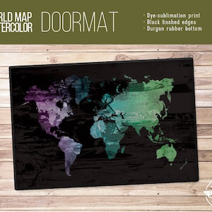 May include: A black doormat with a watercolor world map design. The map is in shades of green, purple, and blue. The doormat has black finished edges and a Durgun rubber bottom.