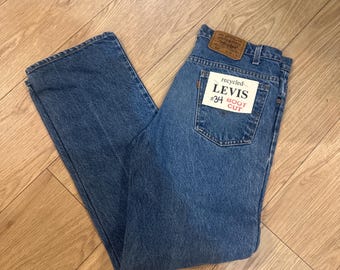 Jeans Levi’s 517 Boot Cut vintage con etiqueta naranja