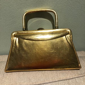 Superbe pochette vintage Deadstock en or