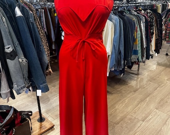 Vintage rode jumpsuit uit de jaren 70 met wijde pijpen