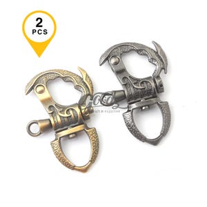 Mosquetón giratorio con resorte (2 unidades, 60 mm) para llavero con cierre de mosquetón de motociclista, latón antiguo - bronce de cañón