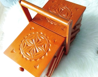 Wooden sewing box, ginger concentrina storage box, cantilevered wooden accordion box with carved geometric design