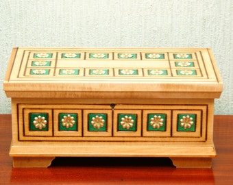 Wooden box for jewelry and trinkets, beige wooden casket with key, decorated  with golden metal flowers