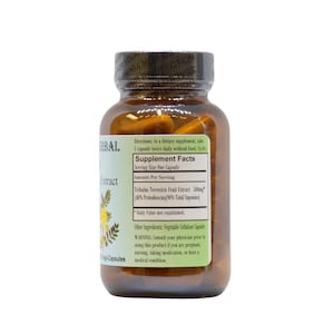 Pode incluir: Uma garrafa de vidro castanho com um r&oacute;tulo branco contendo um suplemento alimentar chamado "Extrato de Fruta de Tribulus Terrestris". O r&oacute;tulo indica que a quantidade por por&ccedil;&atilde;o &eacute; de 500 mg com 4% de Protodioscina e 90% de Saponinas Totais. A garrafa est&aacute; cheia de c&aacute;psulas.