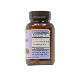 May include: A brown glass bottle with a white label that reads "Safed Musli Root Extract 700mg (50% Saponins) (Wild-Crafted)". The bottle is filled with capsules and has a white cap.