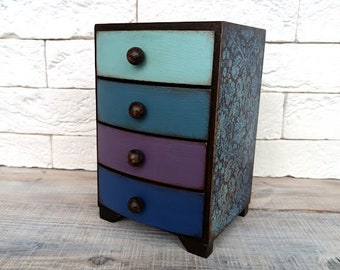 Retro Wooden Cabinet - Jewelry Box with Floral Print in Blue Turquoise Purple Color. Convenient chest of drawers with four drawers