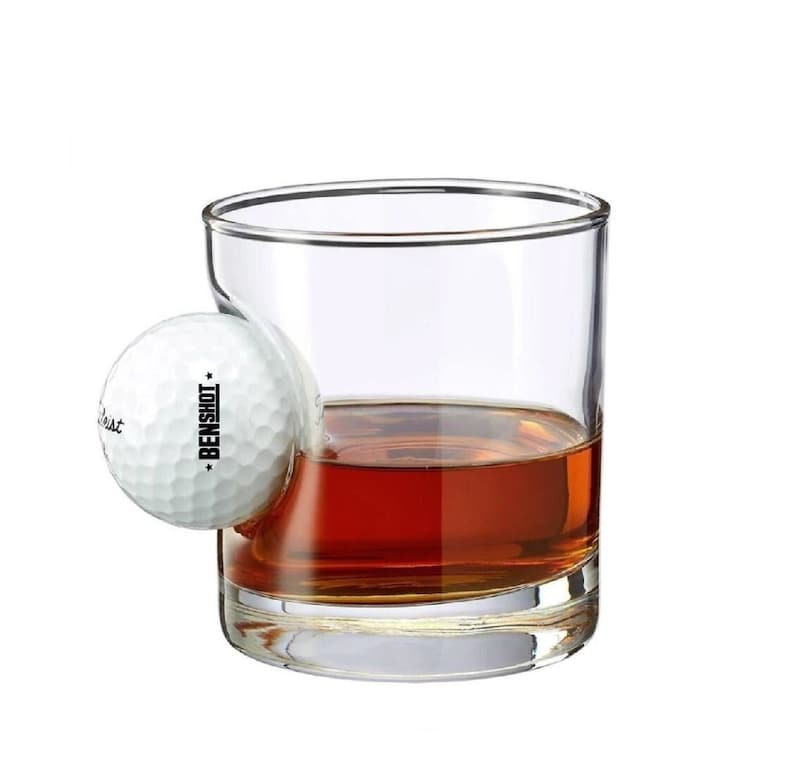 unique transparent rocks glass with a real Titleist Golf Ball is the perfect golf gift for your husband
