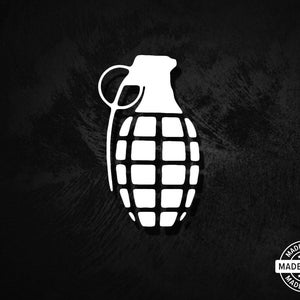 May include: White graphic of a hand grenade on a black background. The grenade is a stylized illustration with a detailed segmented body and a pull ring. A "Made in USA" seal is in the lower right corner.