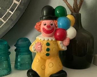 Vintage plastic Clown with Balloons coin bank