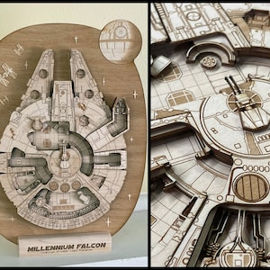 May include: A wooden model of the Millennium Falcon spaceship from Star Wars. The model is detailed and intricate, with a light brown finish. The model is mounted on a wooden base with the text "MILLENNIUM FALCON Corellian YT-1300 Light Freighter" printed on it.