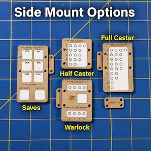 May include: A collection of side mount options for tabletop gaming. The image shows several rectangular cardboard pieces with various labels and layouts, including "Saves," "Half Caster," "Warlock," and "Full Caster." The text "Side Mount Options" is at the top.