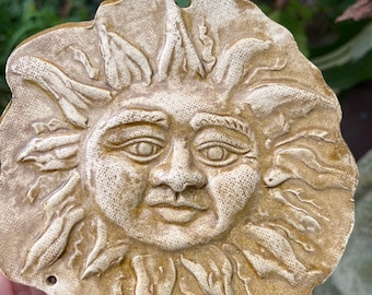 SUN face windchimes - no they don't break that easy! Unique sound!