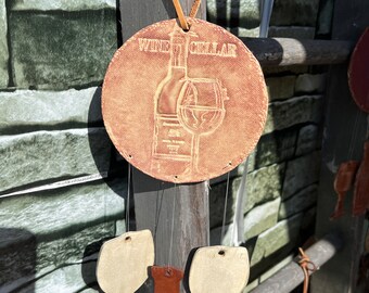 Wine windchimes - no they don’t break that easily! Sound is unique!
