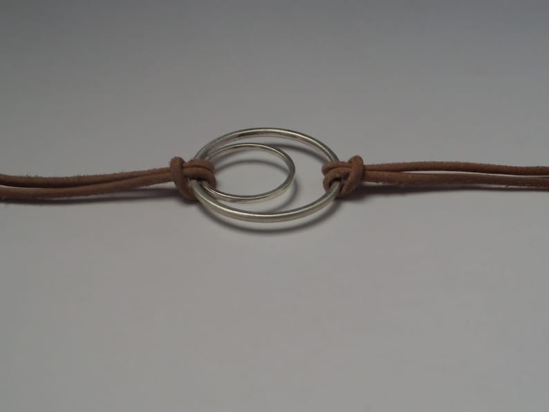 Boho Bracelet with Geometric Sterling Silver Figure and Leather Cord