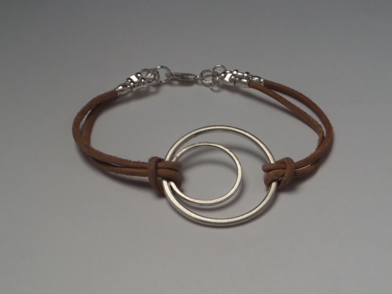 Boho Bracelet with Geometric Sterling Silver Figure and Leather Cord
