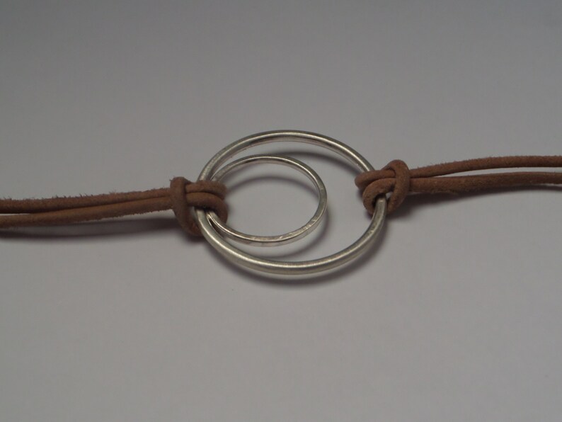 Boho Bracelet with Geometric Sterling Silver Figure and Leather Cord