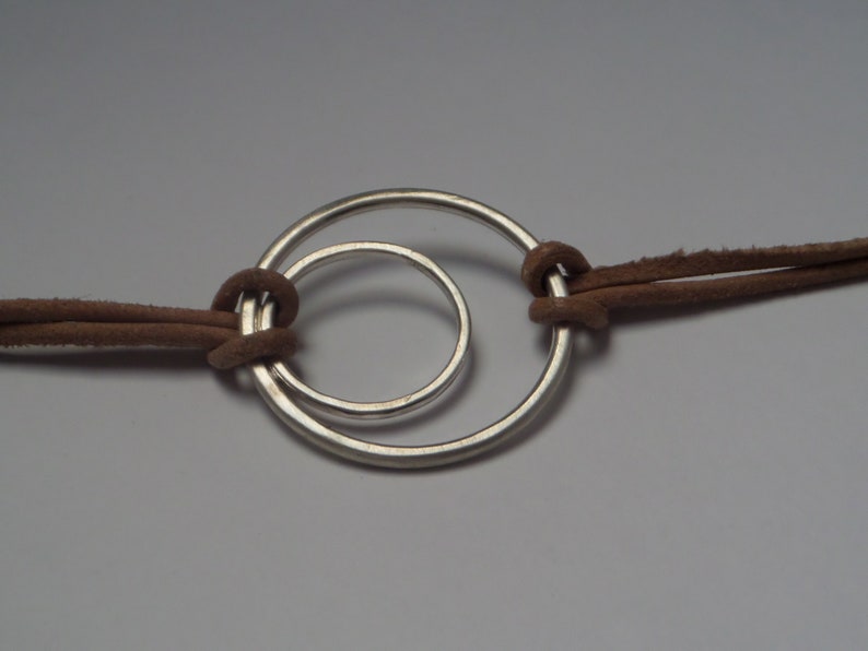Boho Bracelet with Geometric Sterling Silver Figure and Leather Cord