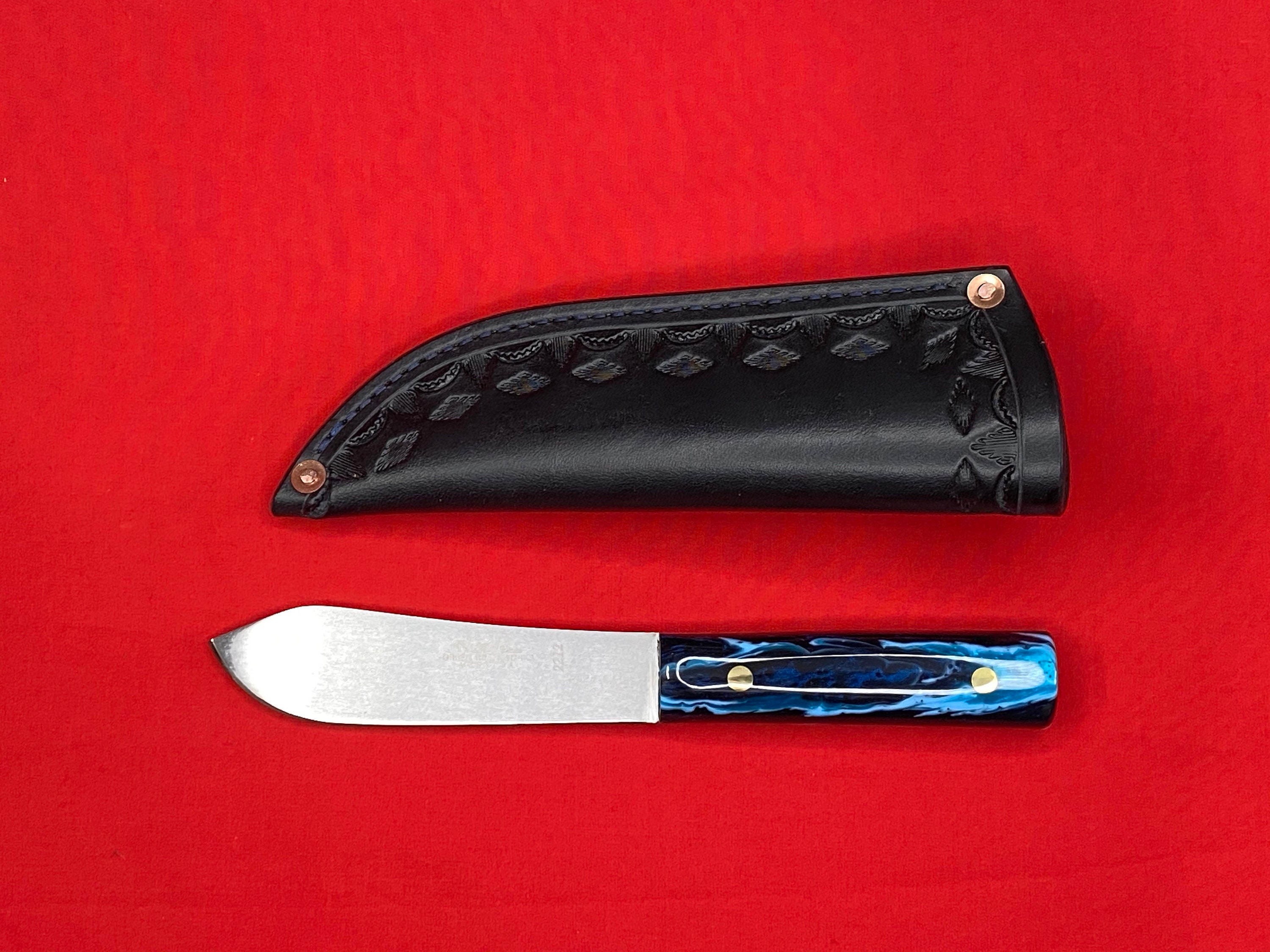 Russell fixed blade knife with custom leather sheath