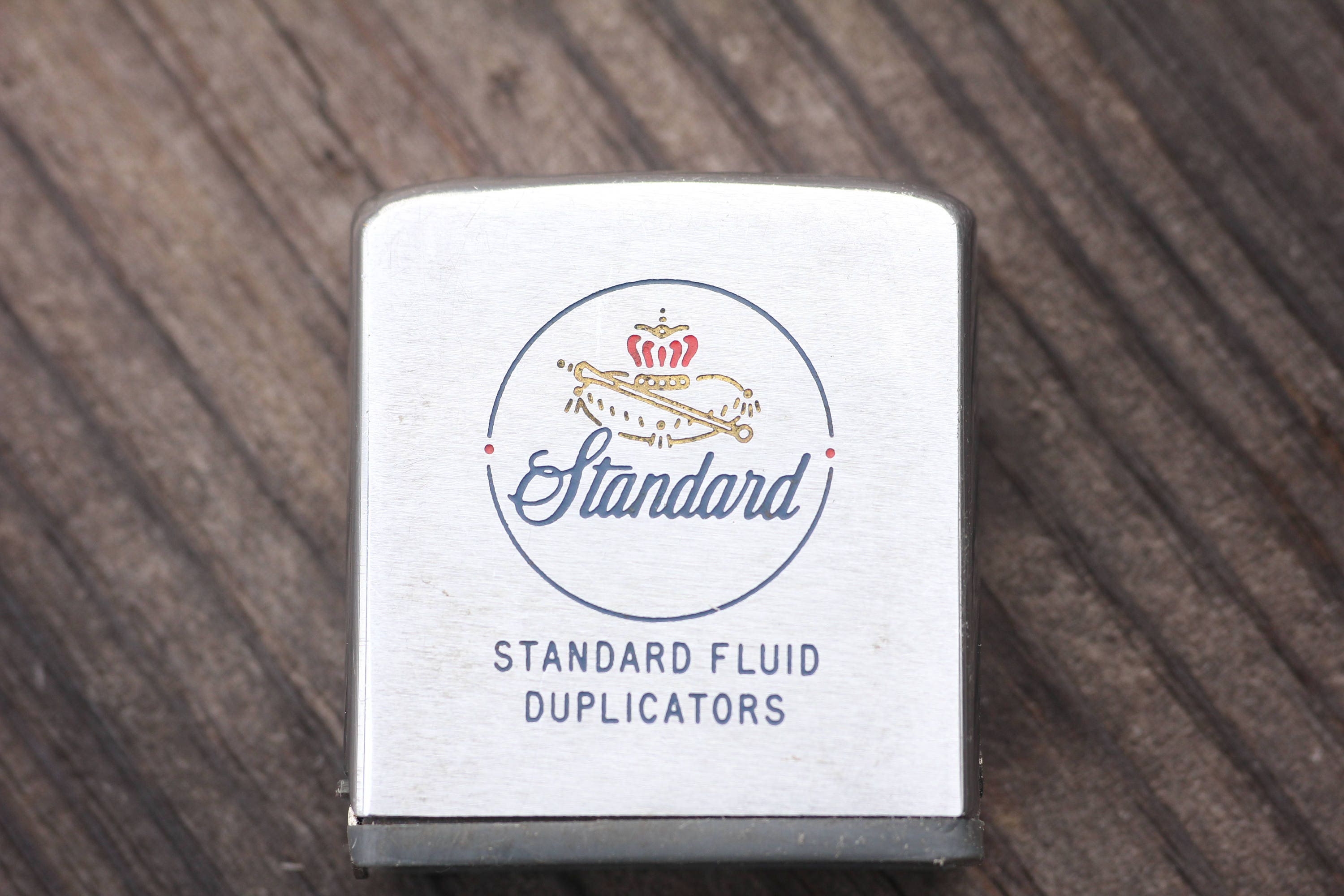 Vintage Zippo advertising tape measure from Standard Fluid Duplicators