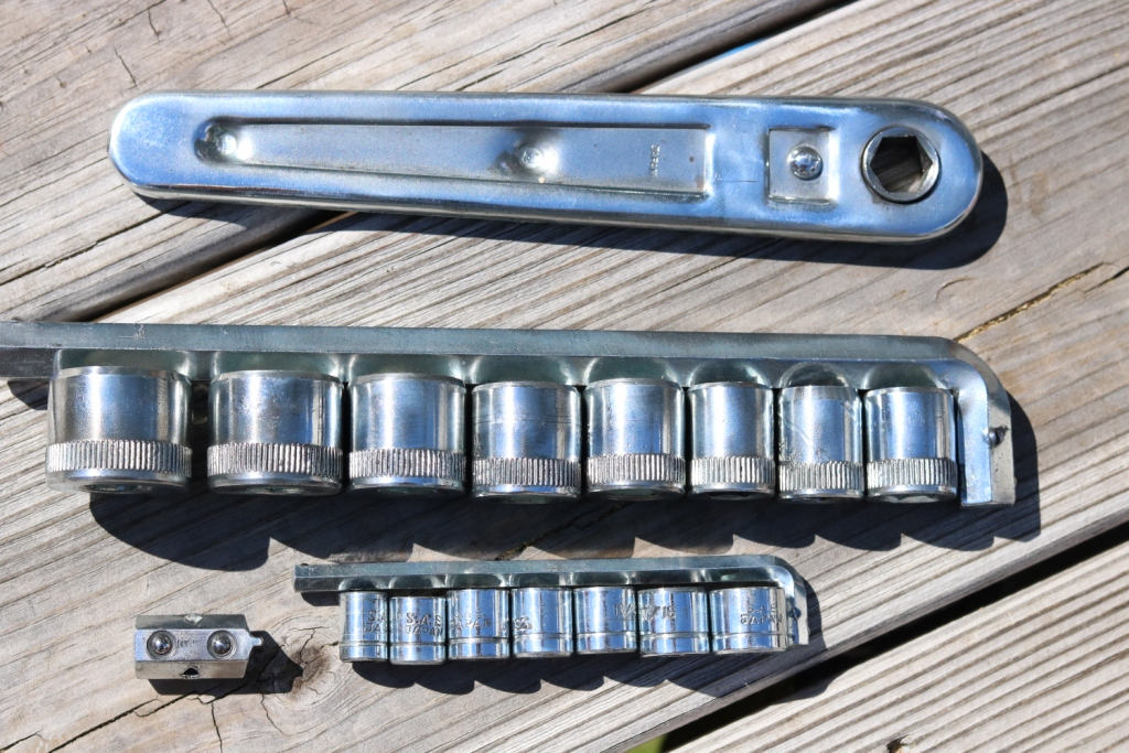 Vintage socket set with wall bracket