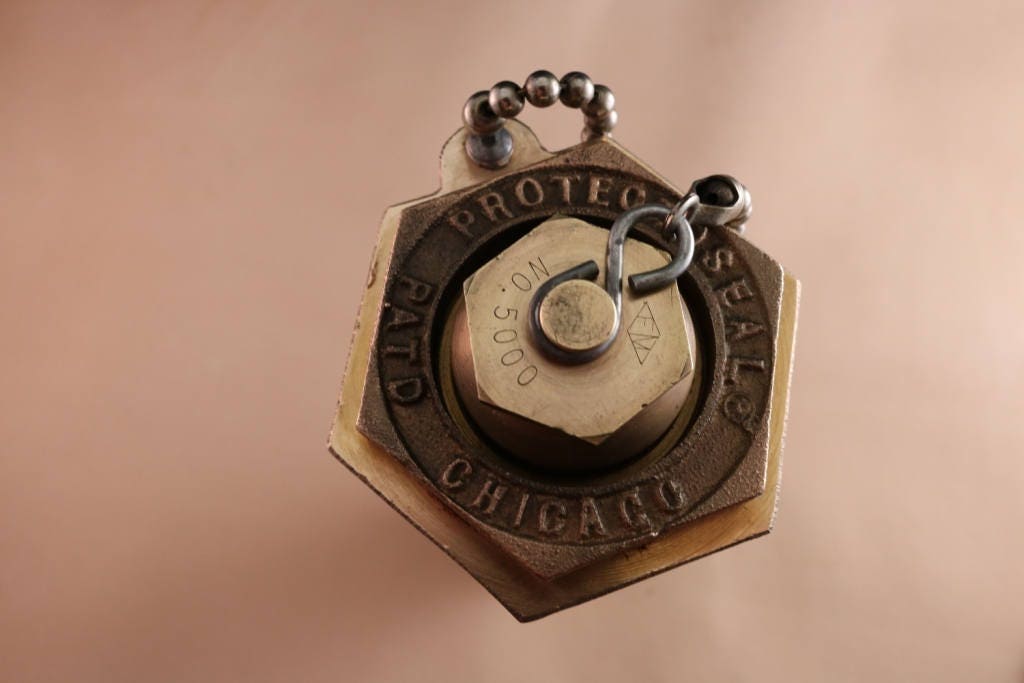 Vintage brass Protectoseal fuel tank safety cap