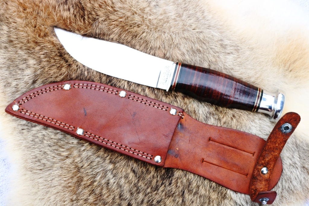 Vintage Ka Bar fixed blade hunting knife with original sheath