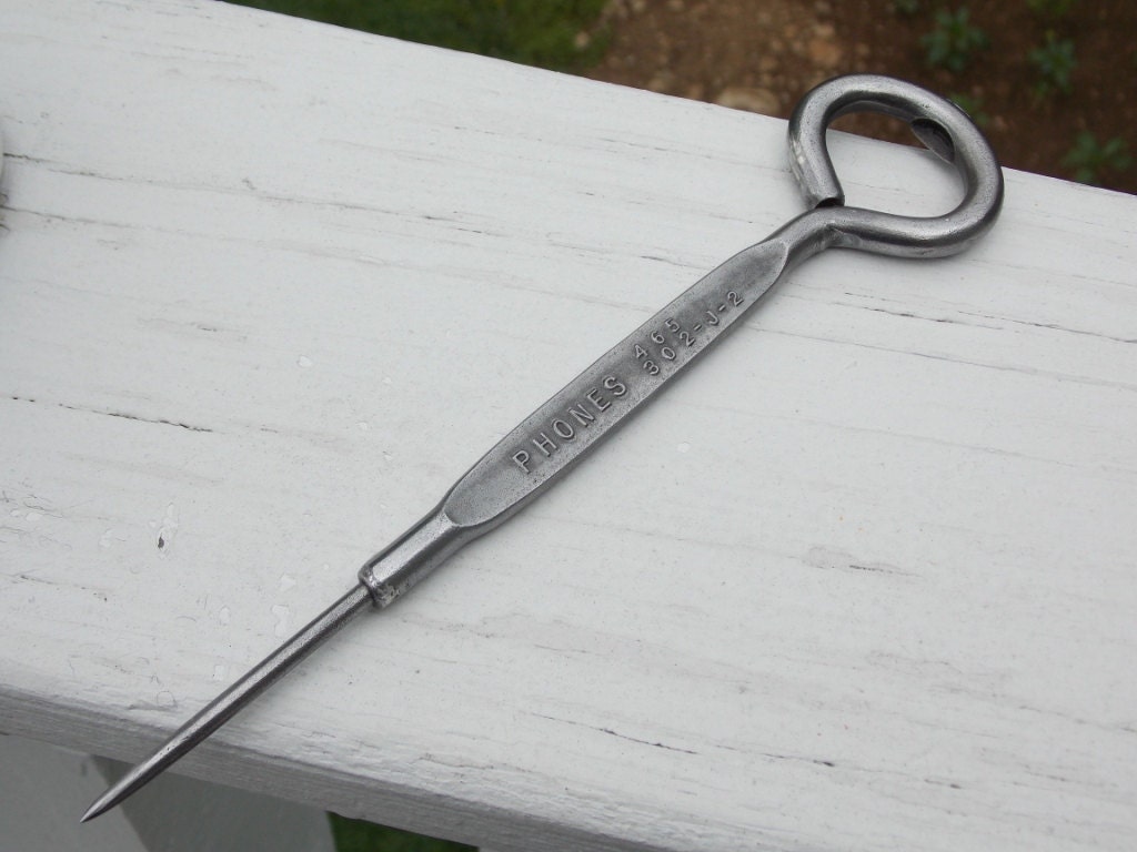 Vintage ice pick with bottle opener from William Kiehl coalicecement co.