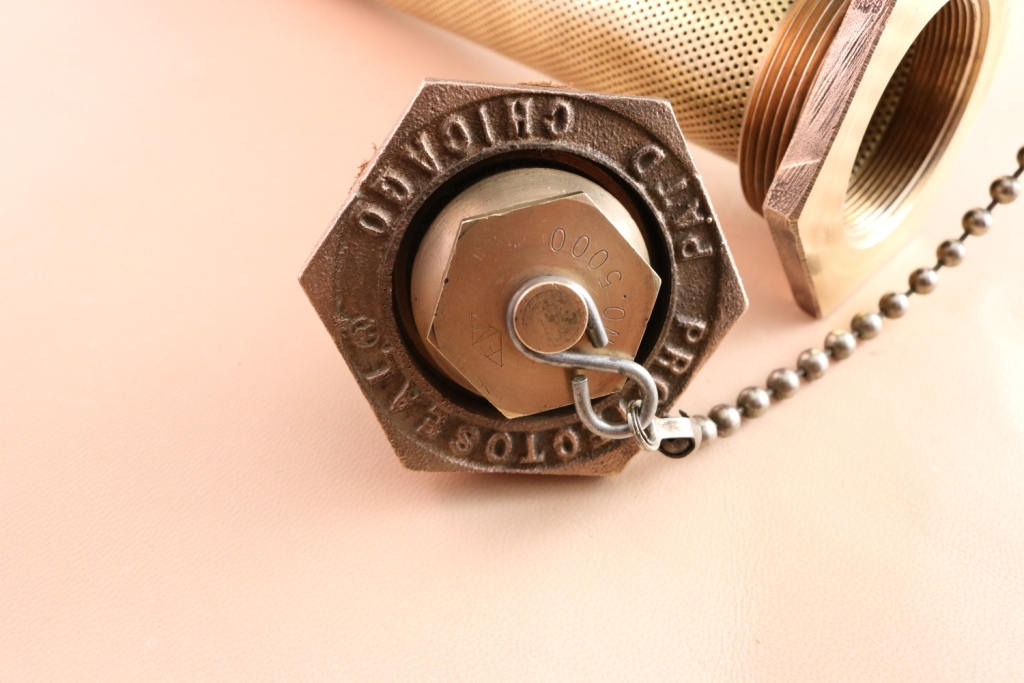 Vintage brass Protectoseal fuel tank safety cap