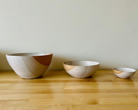 Angeled white speckled bowls. Assorted sizes. Handmade.