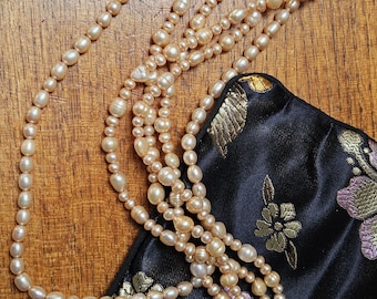 Honora Pearls, Triple Strand Necklace, Lovely Lustrous Peachy Pink Colour, Large and Small Beads, in Black and Floral Pouch.