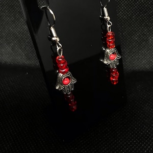 Red hamza hand earrings