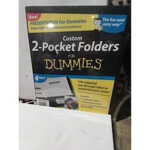 May include: A black and yellow presentation folder set titled "Presentation for Dummies". The front cover features the text "Custom 2-Pocket Folders for Dummies" and includes a 4-pack label. The set includes folders, labels, and a presentation tips booklet.