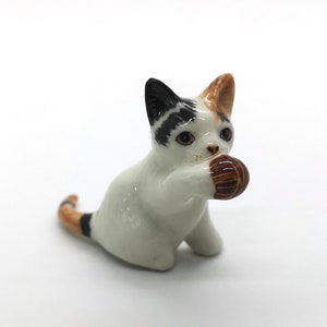 Handmade Ceramic Calico Cat Figurine: Miniature Porcelain Collectible