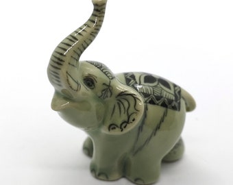 Handmade Ceramic Elephant Figurine: Elegant Animal Decor