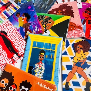 May include: A set of colorful magnets featuring illustrations of women with different hairstyles and outfits. The magnets have a variety of backgrounds, including a cityscape, a tropical island, and a geometric pattern. The text "Nelly The Great" is visible on one of the magnets.