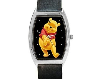 Winnie l'ourson sur une montre baril pour femme avec bracelet en cuir - Navires en provenance de Hong Kong