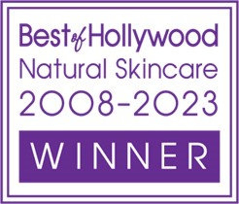 May include: Purple award badge with the text "Best of Hollywood Natural Skincare 2008-2023" and the word "WINNER" in a white rectangle.