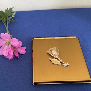 Vintage Square Compact Mirror. Measures  8cms Square approx. Magnifying Mirror to one side.