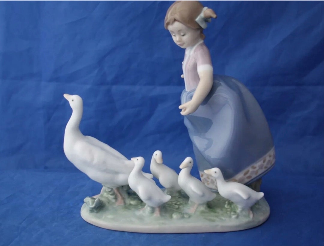 Lladro “hurry Now” . #5503. Featuring Girl/goose/goslings. Retired