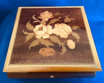 Vintage Wooden Box with Floral Inlay. Four raised feet. Highly Collectible.